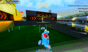 A player playing the track E04-Obstacle in TrackMania Nations Forever